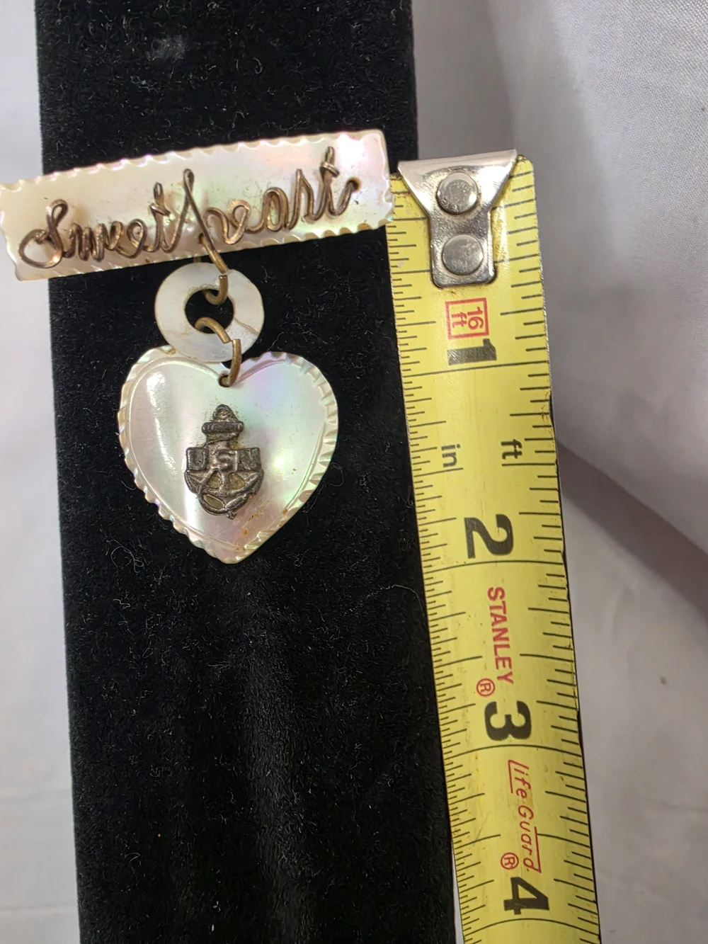 Vintage World War II-era U.S. Navy sweetheart brooch, made from carved MOP